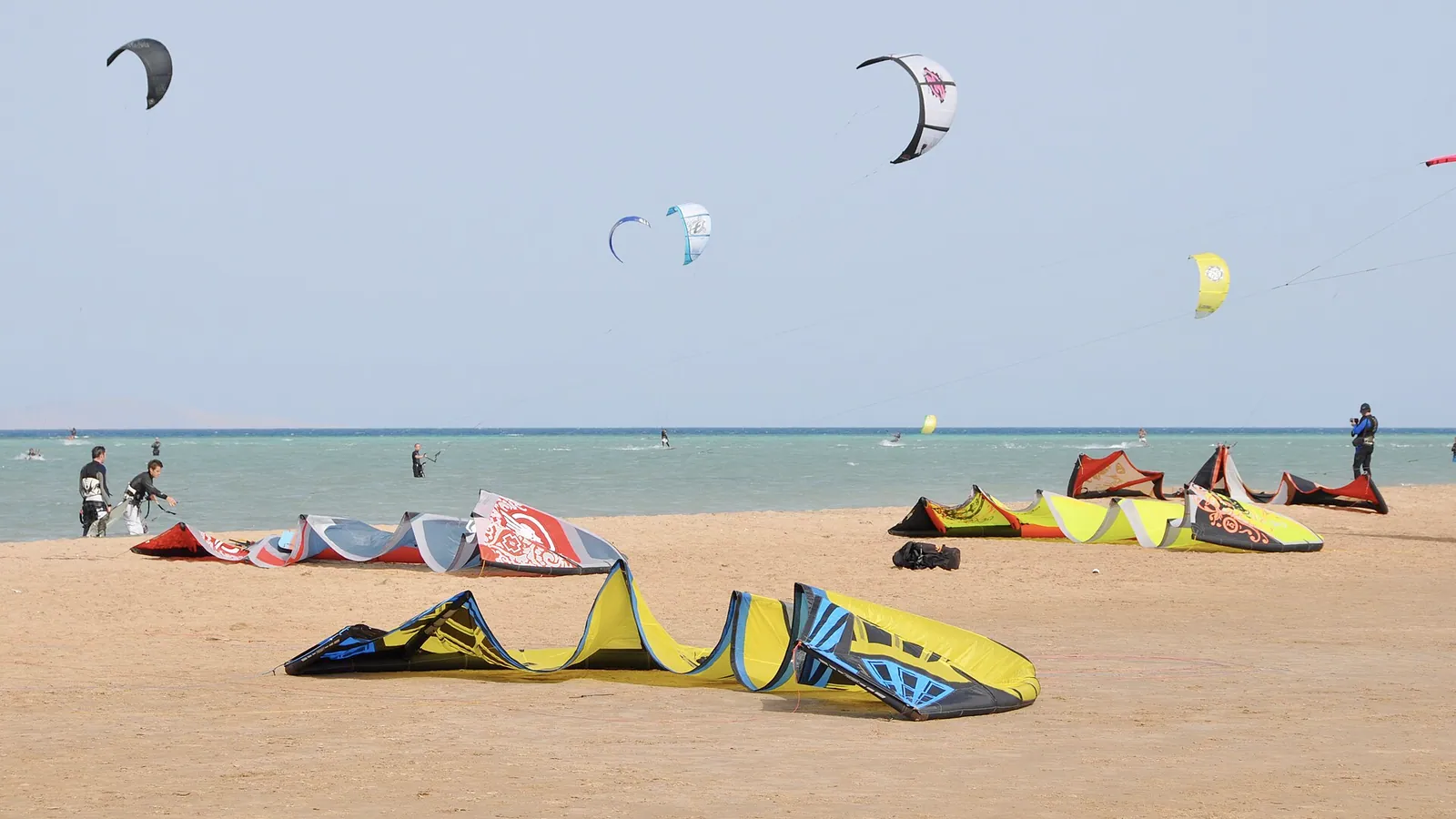 Kitesurfers and kites on the beach at El Gouna on the Red Sea
